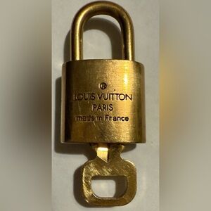 Louis Vuitton Brass Lock and Key (1) Handbag Purse Clutch Tote Made in France